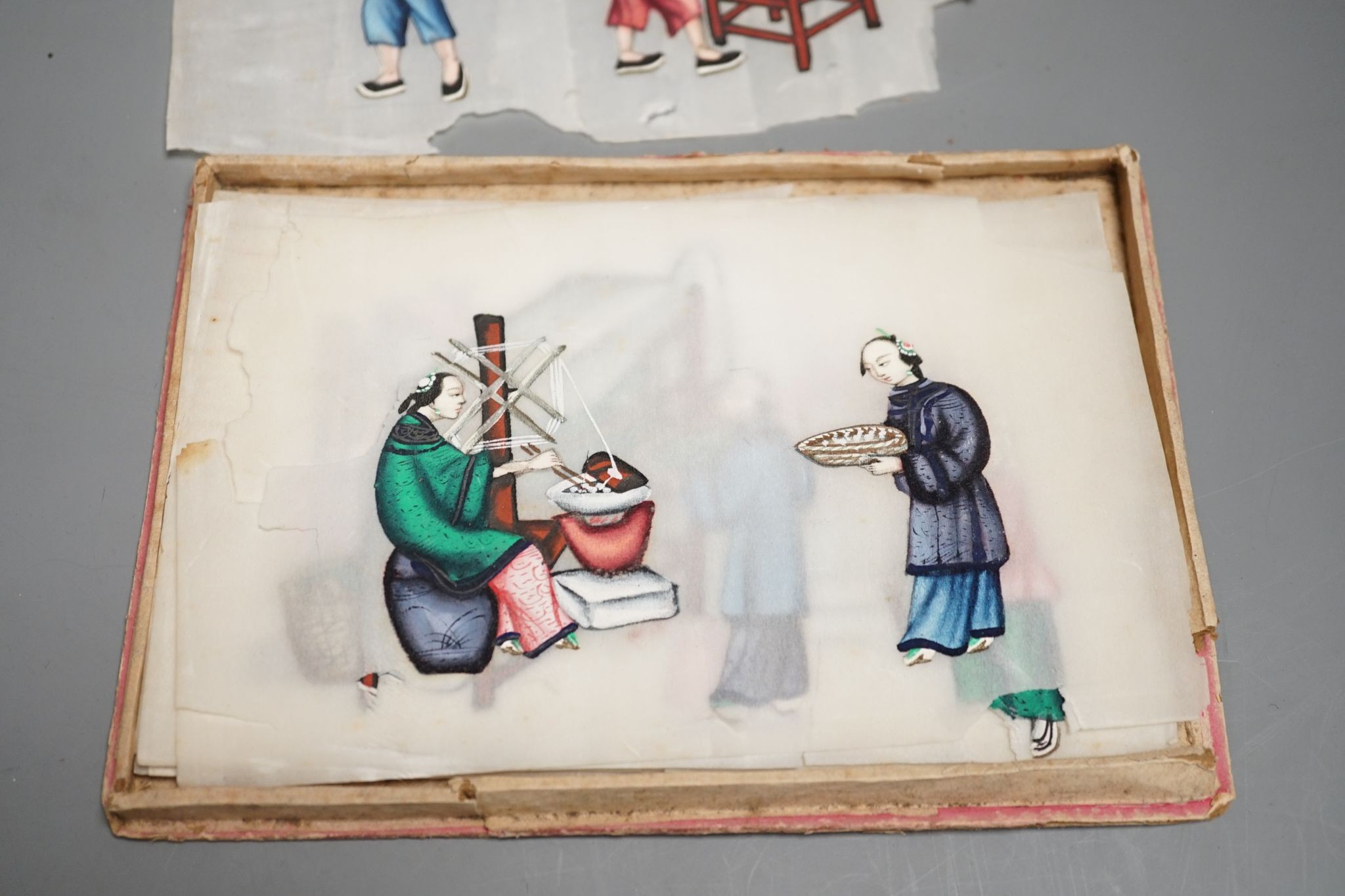 A group of Chinese pith paintings of court figures, production etc. and a pair of Chinese enamelled porcelain plates